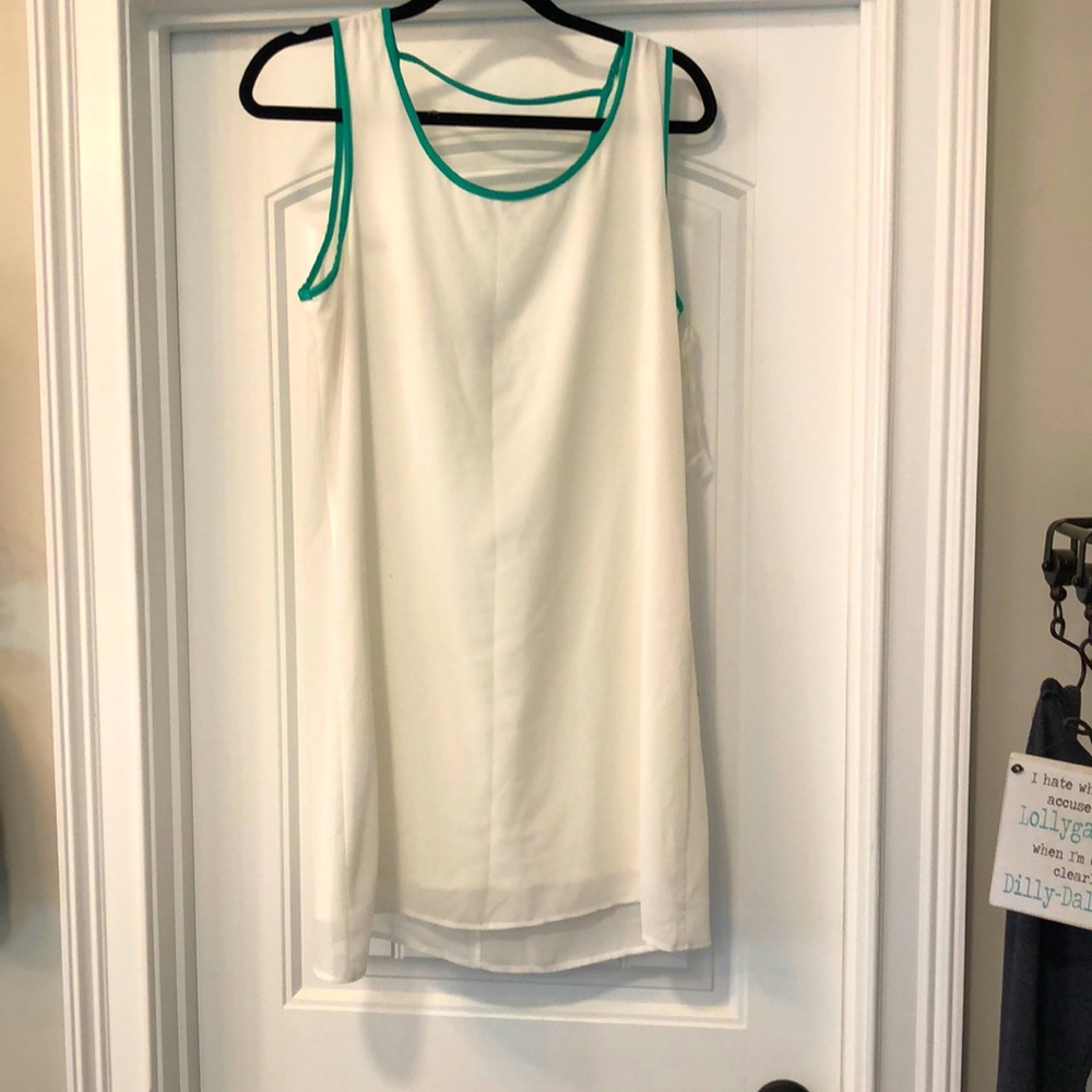 Knee length dress with green bow in back